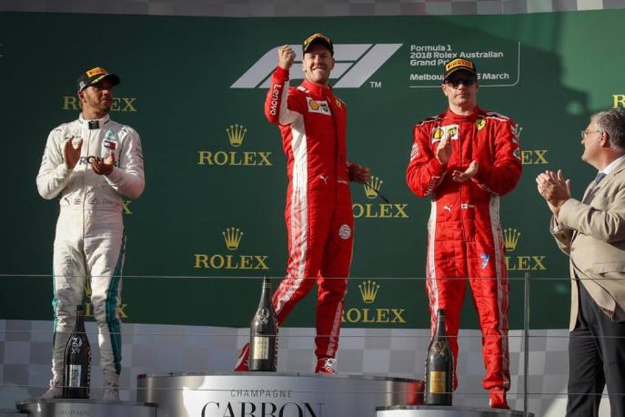 Sul podio  festa grande con Vettel davanti a Hamilton e Raikkonen. Epa